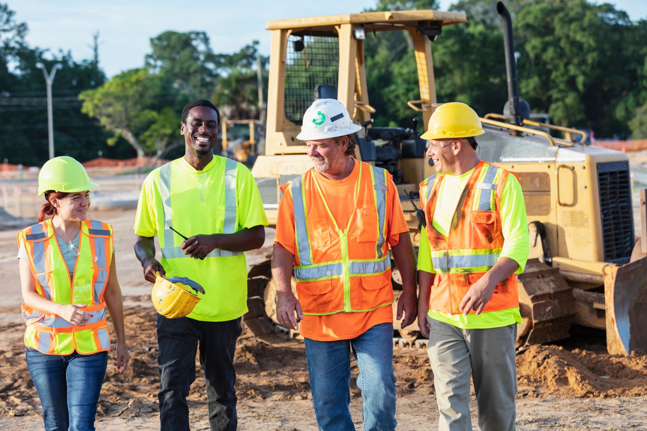 Construction team walking through an active job site in Charlotte, NC